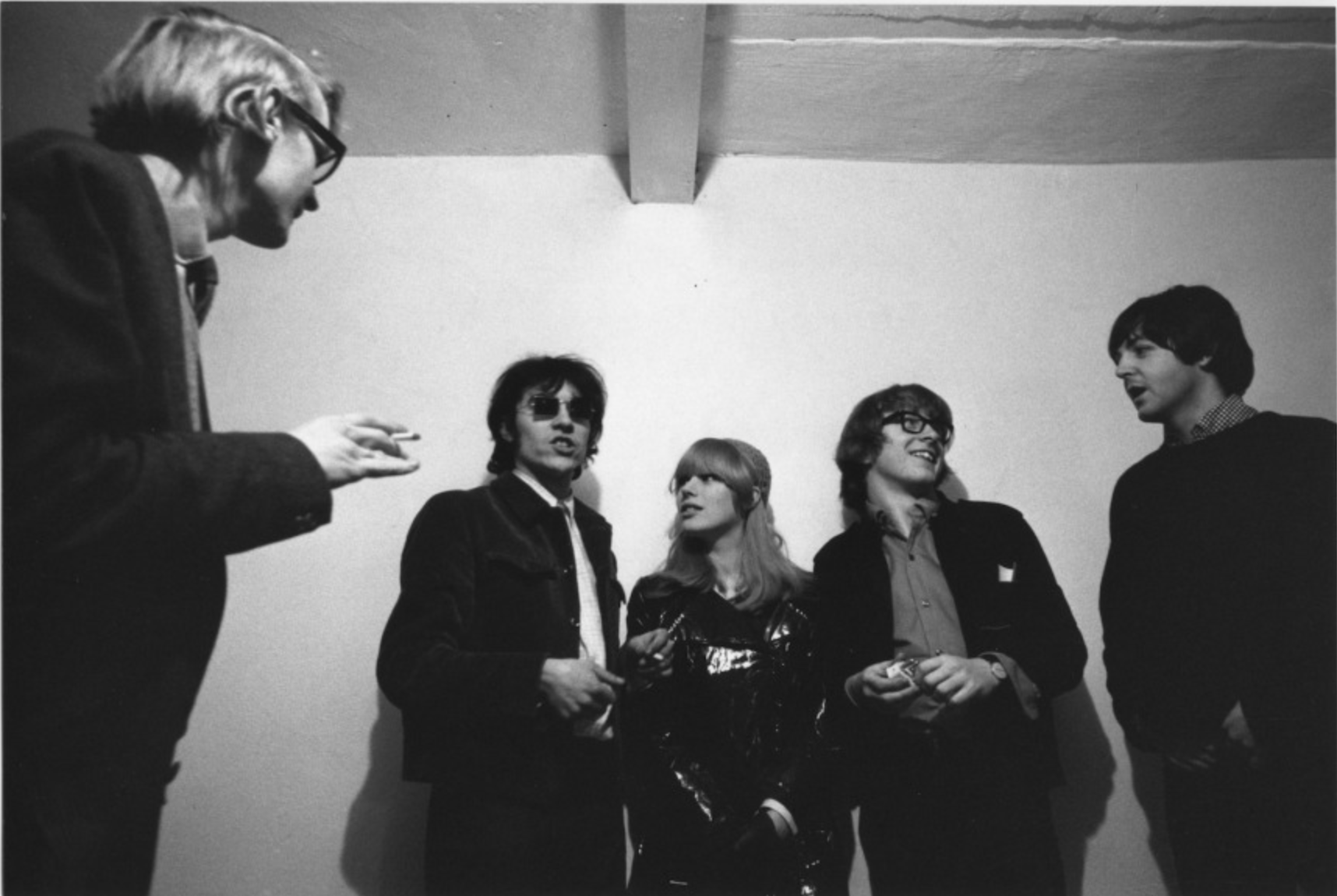 Left to Right: Barry Miles, John Dunbar, Marianne Faithfull, Peter Asher and Paul McCartney in Indica, 1965. 