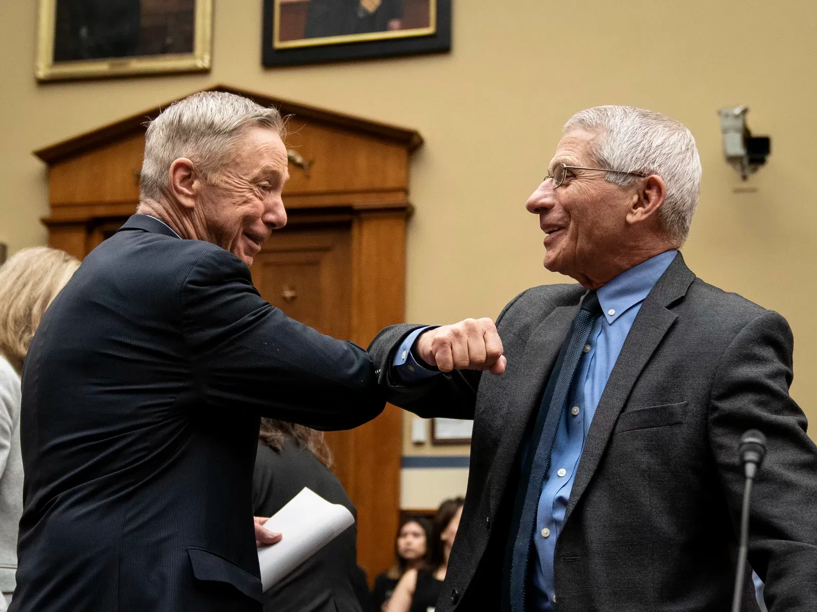 David Lynch D-Mass and Dr Anthony Fauci greeting each other March 11, 2020: Getty Images